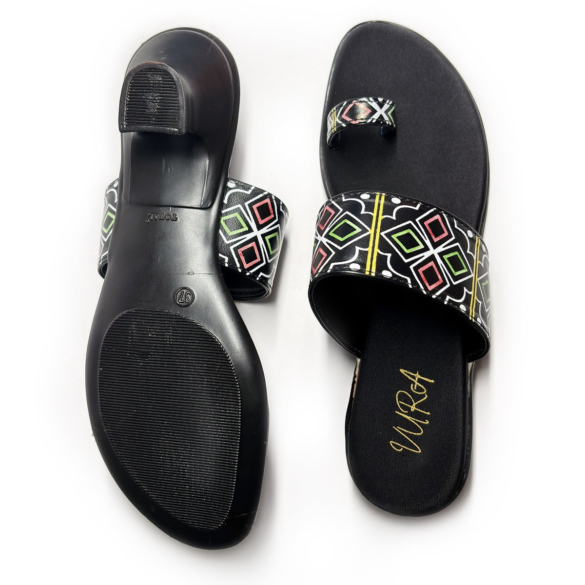 VURA Aly women's black kitten heel sandals featuring a geometric pattern on the strap and a comfortable toe loop.